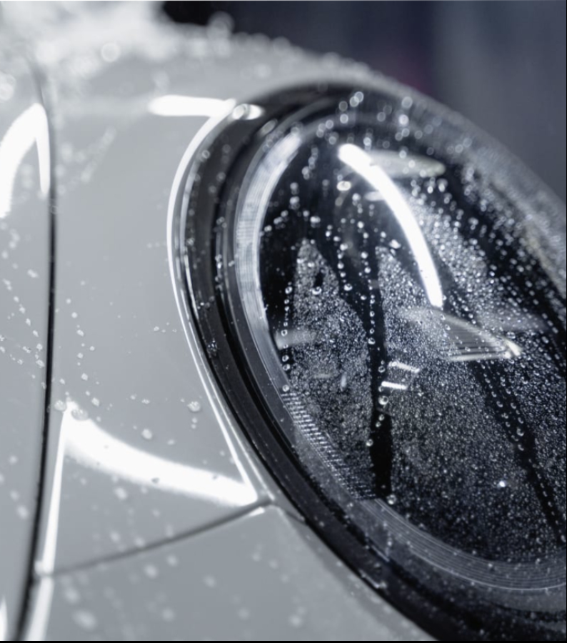 Headlight detail with water droplets