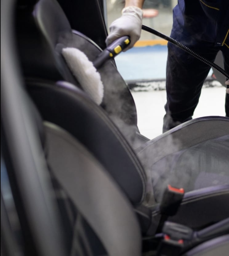 Steam cleaning vehicle interior